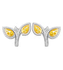 Bypass earrings in platinum and 18K yellow gold with fancy yellow pear-shaped diamonds and pavé diamond halo