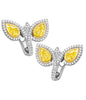 Bypass earrings in platinum and 18K yellow gold with fancy yellow pear-shaped diamonds and pavé diamond halo